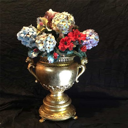 Gold cup with hydrangeas